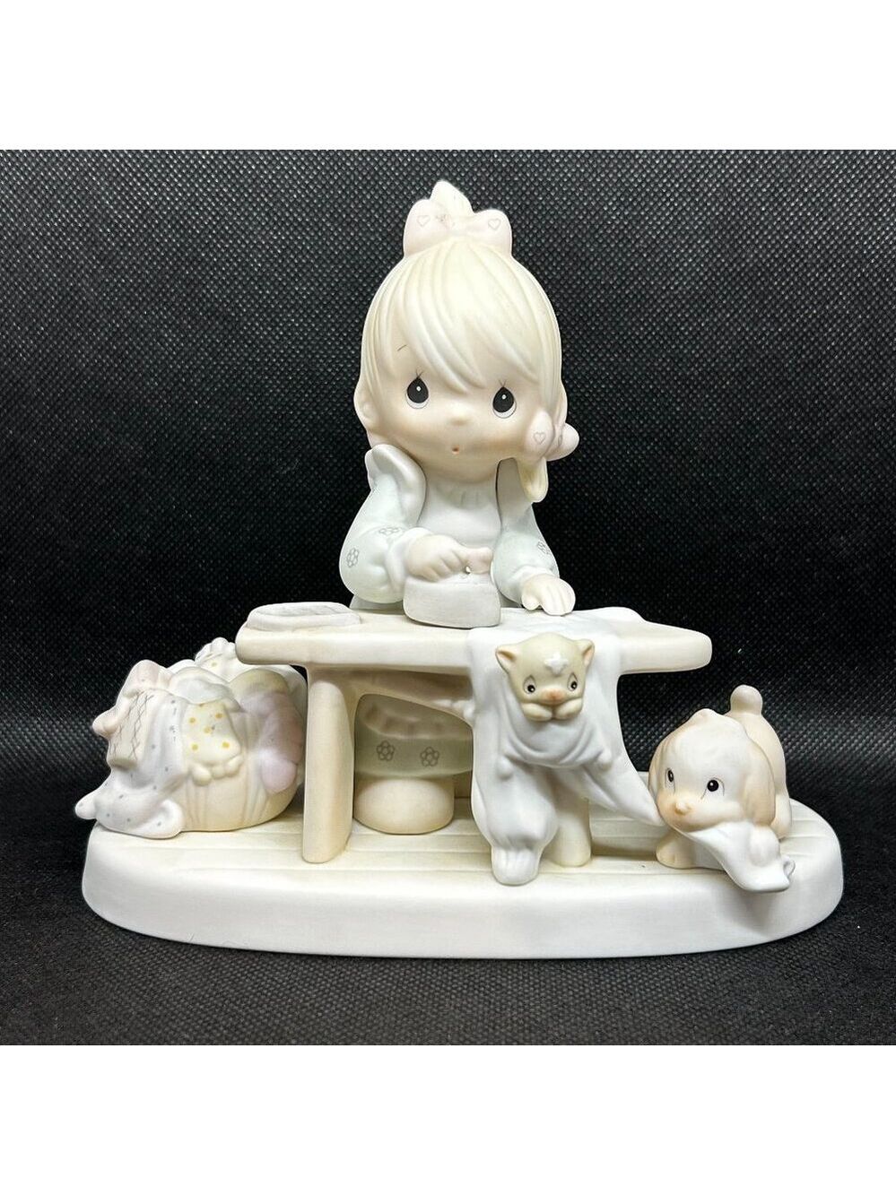Precious Moments "Press On" figurine